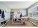 Well-lit office space with a large window, neutral decor, and functional furniture at 10883 Balfour Dr, Noblesville, IN 46060