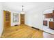 Bright dining room featuring hardwood floors, corner cabinets, and lots of natural light at 1327 Lindberg Rd, Anderson, IN 46012