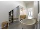 Modern bathroom featuring a stone tub, custom shelving, and stylish vanity at 1333 Chatham Rdg Ct, Westfield, IN 46074