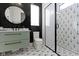 Sleek bathroom with stylish black and white tile, a modern vanity, and a glass-enclosed shower at 1333 Chatham Rdg Ct, Westfield, IN 46074
