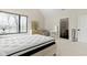 Bright bedroom featuring neutral decor, ensuite bathroom, and natural light at 1333 Chatham Rdg Ct, Westfield, IN 46074
