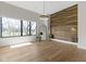 Spacious bedroom boasts an accent wall, hardwood floors, and large picture window at 1333 Chatham Rdg Ct, Westfield, IN 46074