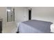A view of the bedroom with the ensuite bathroom and walk-in closet entrances visible at 1333 Chatham Rdg Ct, Westfield, IN 46074