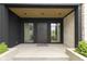 Home's front door with natural wood, windows, and modern design at 1333 Chatham Rdg Ct, Westfield, IN 46074