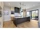Stylish kitchen featuring a large island, modern cabinetry, and stainless steel appliances at 1333 Chatham Rdg Ct, Westfield, IN 46074