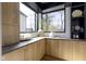 Bright kitchen features stylish cabinets, countertops, and a large window overlooking the outdoors at 1333 Chatham Rdg Ct, Westfield, IN 46074