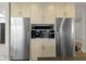 Kitchen with stainless steel appliances, custom cabinetry, and built-in coffee maker at 1333 Chatham Rdg Ct, Westfield, IN 46074