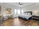 Bright main bedroom with a ceiling fan, a sitting area, and ample natural light at 1333 Chatham Rdg Ct, Westfield, IN 46074