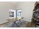 Stylish office area with light-filled views, built-in shelving, and an open floor plan at 1333 Chatham Rdg Ct, Westfield, IN 46074
