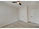 Bright bedroom with carpet floors and white doors at 13392 Dorster St, Fishers, IN 46037