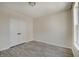 Bright bedroom featuring wood floors and double doors at 13392 Dorster St, Fishers, IN 46037