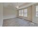 Bright bedroom with hardwood floors, recessed lighting, and large windows at 13392 Dorster St, Fishers, IN 46037