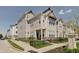 Charming multi-story home with manicured landscaping and sidewalk at 13392 Dorster St, Fishers, IN 46037