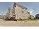 Exterior view of townhomes with attached garages and well-maintained landscaping at 13392 Dorster St, Fishers, IN 46037
