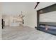 Modern living room with an open floor plan and stylish fireplace at 13392 Dorster St, Fishers, IN 46037