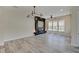 Spacious living room features a modern fireplace and stylish lighting at 13392 Dorster St, Fishers, IN 46037