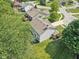 Aerial view showcasing the home's location in a tree-lined neighborhood at 13562 Silver Spur, Carmel, IN 46032