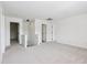 Upstairs landing boasting neutral carpet and multiple doorways to rooms at 13562 Silver Spur, Carmel, IN 46032