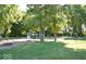 Community playground with swings, slides, and a merry-go-round, providing a fun and safe recreational area at 13717 Van Buren Pl, Fishers, IN 46038