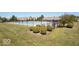 Community pool surrounded by a secure fence, offering a refreshing recreational space for residents at 13717 Van Buren Pl, Fishers, IN 46038