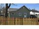 Backyard view featuring a fenced yard and a house with siding, offering privacy and outdoor space at 1378 Hannibal St, Noblesville, IN 46060