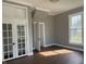 Bedroom with a large window and closet, showcasing natural light and hardwood floors at 1378 Hannibal St, Noblesville, IN 46060