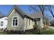 This exterior view showcases the property's design, well-kept lawn, and surrounding greenery at 1378 Hannibal St, Noblesville, IN 46060