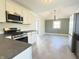A well-designed kitchen with stainless steel appliances and ample cabinet space flows into the dining area at 1378 Hannibal St, Noblesville, IN 46060