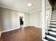 Spacious living room with hardwood floors and access to the kitchen at 1378 Hannibal St, Noblesville, IN 46060