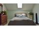 Bright bedroom featuring natural light, a comfortable bed, and elegant furnishings, creating a peaceful and inviting retreat at 1404 Broadway St # Apt G, Indianapolis, IN 46202