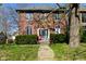 Charming brick home with manicured landscaping and a welcoming entryway, perfect for a cozy and inviting atmosphere at 1404 Broadway St # Apt G, Indianapolis, IN 46202