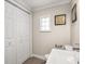 Clean bathroom with modern toilet, sink and ample storage at 1429 Fletcher Ave, Indianapolis, IN 46203