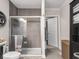 Contemporary bathroom with a glass shower, cabinet and tile flooring at 1429 Fletcher Ave, Indianapolis, IN 46203