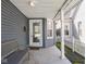 Welcoming front porch with a bench and a view of the charming neighborhood at 1429 Fletcher Ave, Indianapolis, IN 46203