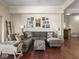 Spacious living room with hardwood floors, comfortable seating, and stylish decor, creating an inviting atmosphere at 1429 Fletcher Ave, Indianapolis, IN 46203