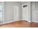 The bedroom features pristine white trim and an alcove for storage at 1509 Sycamore St, Columbus, IN 47201