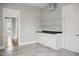 Bright eat-in kitchen with gray flooring, stainless appliances, and white trim at 1509 Sycamore St, Columbus, IN 47201