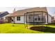 Spacious backyard featuring a trampoline and view of the house at 15655 Woodford Dr, Westfield, IN 46074