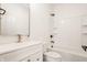 Clean white bathroom with tub and shower combination, bright light, and vanity at 15655 Woodford Dr, Westfield, IN 46074