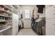 Well-organized walk-in closet offering ample storage with built-in shelving and drawer units at 15655 Woodford Dr, Westfield, IN 46074