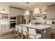 Spacious kitchen with a large island, stainless steel appliances, and ample storage at 15655 Woodford Dr, Westfield, IN 46074
