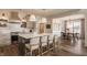 Gourmet kitchen with stainless steel appliances and a large center island at 15655 Woodford Dr, Westfield, IN 46074
