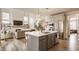 Open kitchen featuring a center island, stainless appliances, and stylish finishes at 15655 Woodford Dr, Westfield, IN 46074