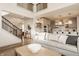 Open floor plan with a view of the living room, kitchen, and staircase at 15655 Woodford Dr, Westfield, IN 46074