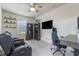 Spacious bedroom featuring a ceiling fan and a comfortable layout with additional seating at 16080 Cabin Hill Dr, Noblesville, IN 46060