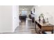 Bright foyer with hardwood floors and an open view into the living room at 16080 Cabin Hill Dr, Noblesville, IN 46060