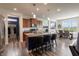 Stylish kitchen featuring an island with seating, stainless steel appliances, and modern cabinetry at 16080 Cabin Hill Dr, Noblesville, IN 46060