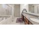 Gorgeous main bathroom with double sinks, granite counters, a luxurious soaking tub, and separate glass door shower at 16080 Cabin Hill Dr, Noblesville, IN 46060