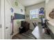 Functional home office featuring lots of natural light, space for desk, and storage solutions at 16080 Cabin Hill Dr, Noblesville, IN 46060