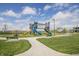 Playground featuring slides, climbing structures, and benches in Finch Creek Park at 16080 Cabin Hill Dr, Noblesville, IN 46060